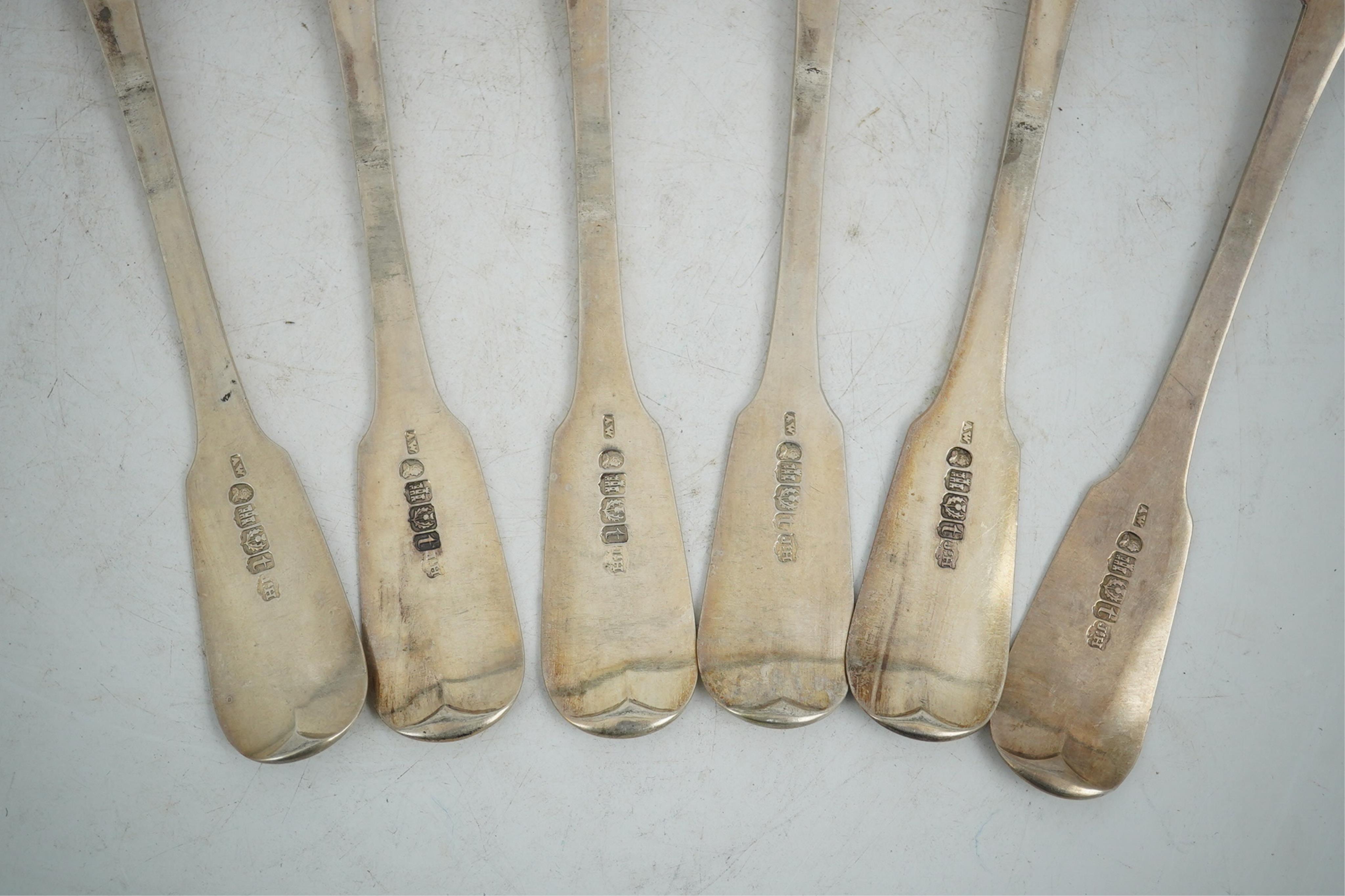 A set of six George IV Scottish silver fiddle pattern table spoons, Andrew Wilkie, Edinburgh, 1825, 13.2oz.